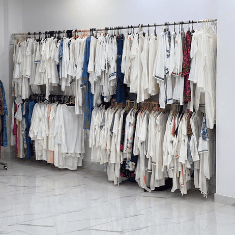 Chikankari order packing process for boutiques showing size sorting, quantity checking and secure packaging before dispatched. Chikankari bulk clothing order