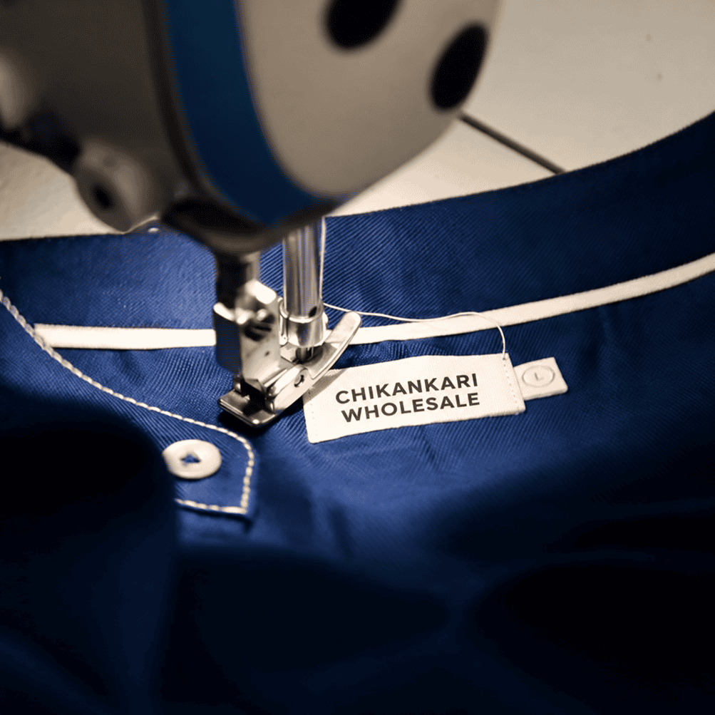 Chikankari product sample being reviewed for stitching quality, embroidery detailing and overall finish before bulk order approval.